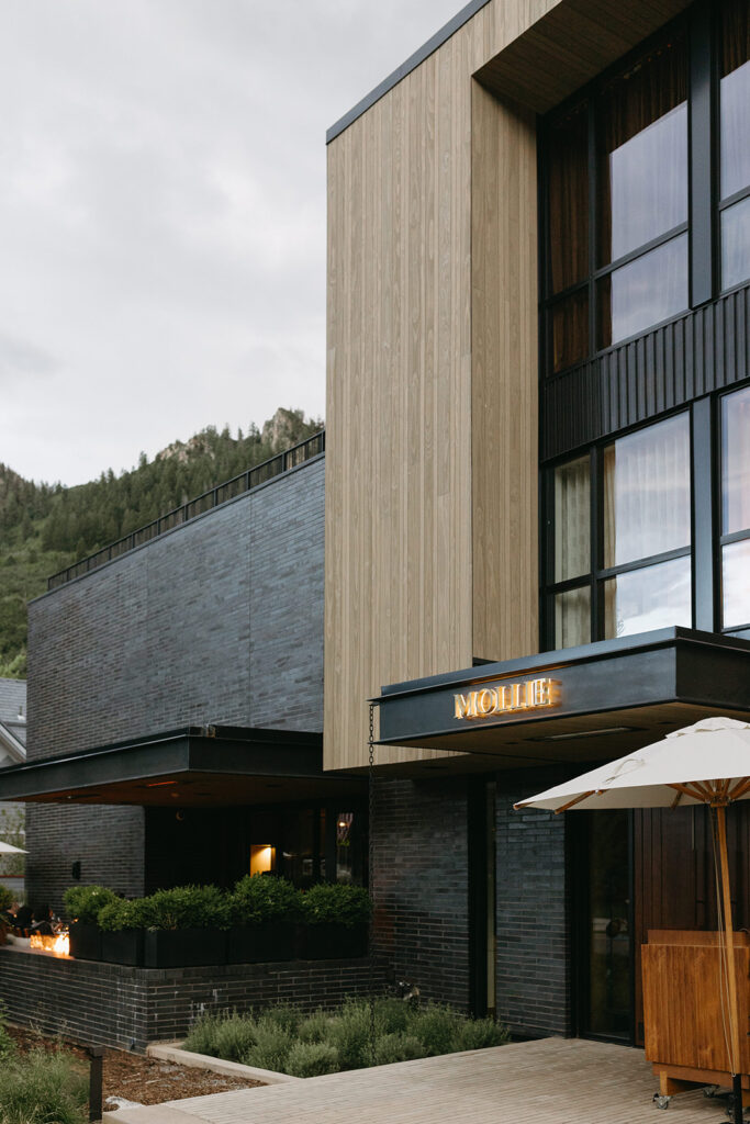 The entrance of the MOLLIE Hotel in Downtown Aspen, a modern intimate wedding venue.